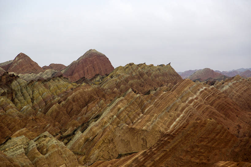 无人,横图,室外,白天,旅游,度假,美景,山,山脉,标志建筑,地标,建筑,中国,亚洲,堆积,曲折,鲜艳,地形,景观,山顶,山坡,建筑群,宏伟,娱乐,建设,风景,天空,自然,享受,休闲,景色,放松,摄影,环境,风化,生态,干旱,贫瘠,自然风光,自然现象,干的,东亚,地貌,甘肃省,丹霞地貌,丝绸之路,张掖,坎坷,崎岖,地质学,风蚀,石化,风蚀地貌,岩石层,自然地理,荒地,岩石,彩图,旅行,地表形态,广角,bj175